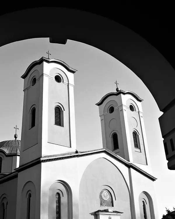 Church of the Ascension in Čačak, seen through an archway